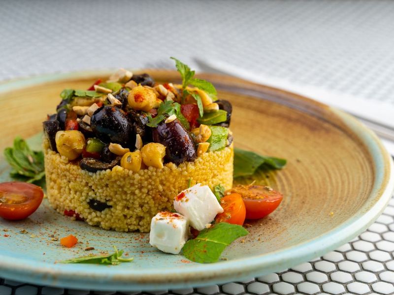Couscous salad with peas and corn
